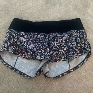 purple/floral lululemon speed up shorts size 4